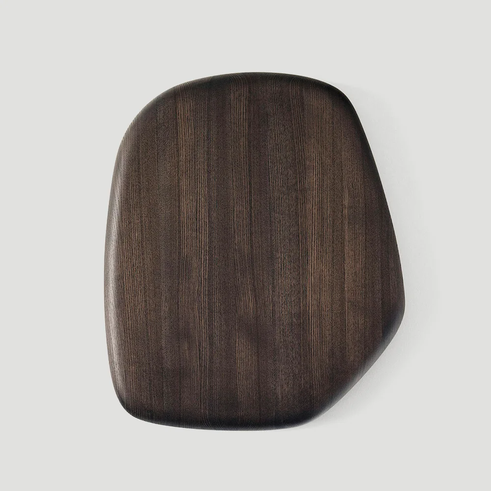 Minimalist wooden sculpture in natural brown tones, featuring smooth, rounded organic shapes