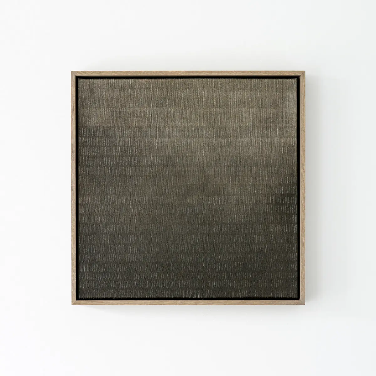 Contemporary minimalist painting by Marta Rószczka, dark charcoal canvas with fine vertical marks in oak framed canvas.