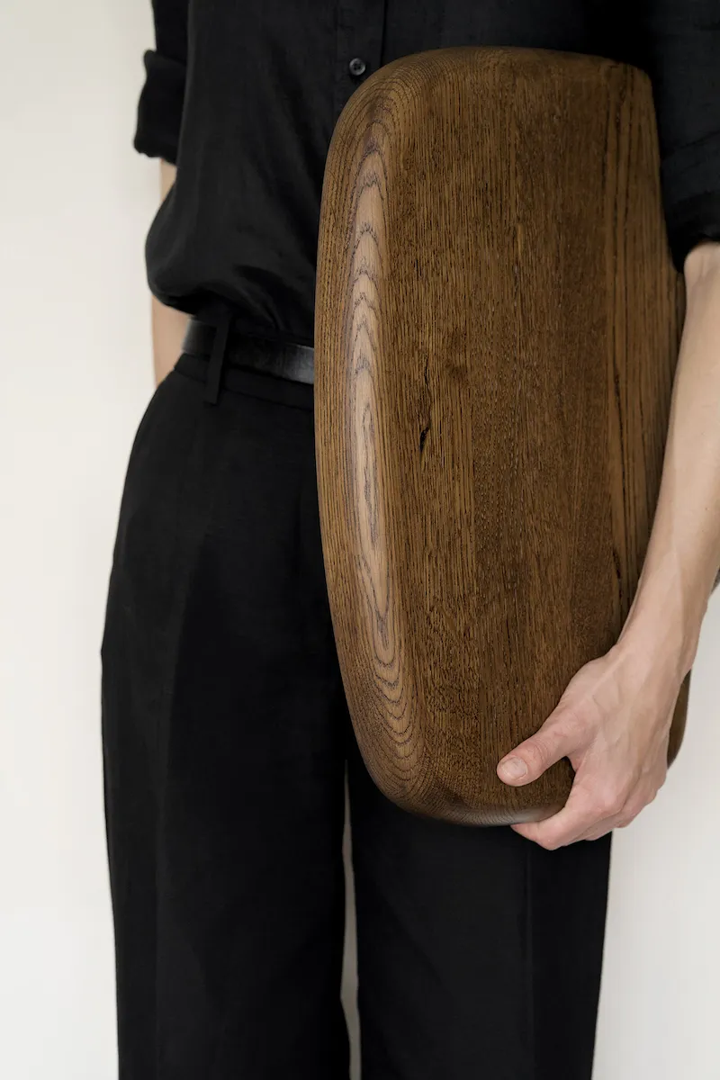 Handmade abstract wood sculpture by Marta Rószczka, minimalist organic form, natural stained finish.